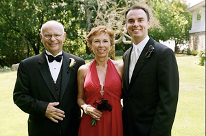 Dad, Mom and Me at my wedding. He usually looks like a tough guy in pictures (that's the Marine in him) but how jolly is he here?!